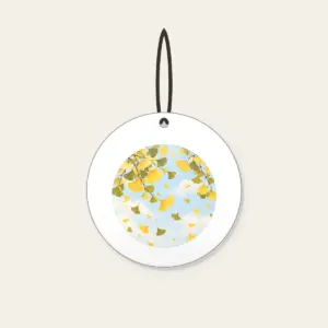 Falling Ginkgo Leaves Ceramic Ornament in white: Ginkgo leaves drift down in butter yellow and olive across a pale, pastel sky.