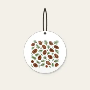 Scattered Pine Cones and Needles Ceramic Ornament in white: Pine cones and needles scatter in brown and green.