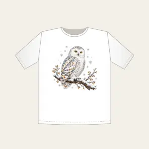 Snowy Owl in Snowfall T-Shirt in white: A snowy owl on a branch in white, slate and amber with falling snowflakes.