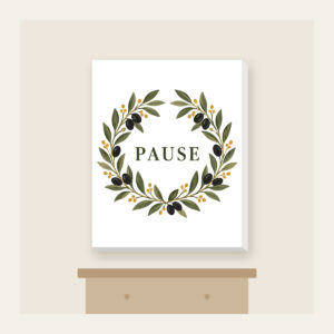 Olive Branch Wreath with PAUSE Canvas Print in white: An olive branch wreath with dark fruits and ochre dots circles the word PAUSE in simple deep green serif letters.