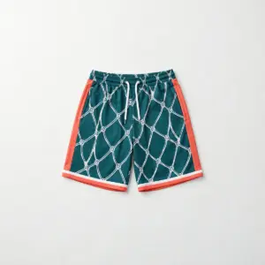 Court Net Jersey Shorts with all-over basketball net pattern in white lines on deep teal with a bold coral side stripe
