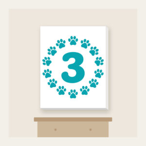 Teal Paw Circle with Number Three Canvas Print in white: A ring of small white paw marks on teal circling the number “3”.