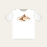 Rolling Dune in Topographic Lines T-Shirt in white: Topographic contour lines shaped into a rolling dune, drawn in warm brown and cream.