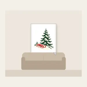 Red Sled on a Snowy Hill Fleece Blanket in white: A small red sled on a snowy hill beside a tall pine in cream, red and green.