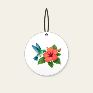 Hummingbird and Hibiscus Ceramic Ornament in white: A hummingbird beside a coral hibiscus flower with green leaves on a pale teal field.