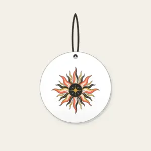 Sunburst Lines on Charcoal with a Small Star Ceramic Ornament in white: Sun lines in coral, gold and white radiate across a charcoal ground, with one small star set off to one side.
