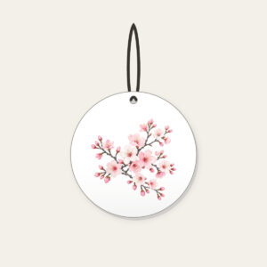 Cherry Blossom Branches on Grey Ceramic Ornament in white: Cherry blossom branches in pale rose and white bloom on a muted grey background.