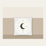 Gilded Constellations and Crescent Moons Pillow in white: Cream and gold constellations and crescent moons drift across a deep navy sky.