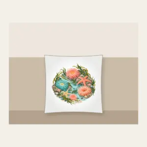 Coral Tidepool Anemones Pillow in white: Anemones, starfish and sea grass gather in coral, teal and sand over a pale aqua ground.