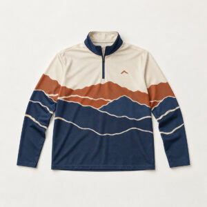 Ridgeline Quarter Zip Long Sleeve Jersey with all-over ridgeline stripes in navy, rust and cream with one small peak mark near the chest