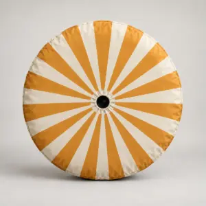 Sunburst Spare Tire Cover with Backup Camera Hole with all-over sunburst rays in amber and cream centred on the cover with a plain circular area for the camera hole