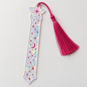 Elongated star hologram bookmark with constellation print and deep pink tassel