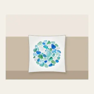 Sea-Glass Pebbles in Blues and Greens Pillow in white: Rounded sea-glass pebbles in pale blues, greens and frosted white.