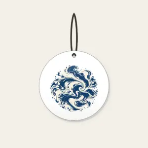 Indigo Marbling Like a Receding Tide Ceramic Ornament in white: Marbling in indigo and cream flows like a tide pulling back.
