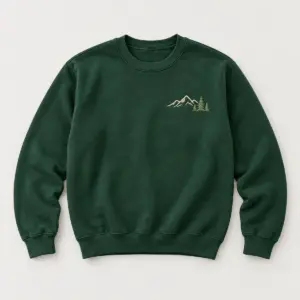 Forest Green Pine Ridge Sweatshirt with three embroidered evergreen trees on the stocking