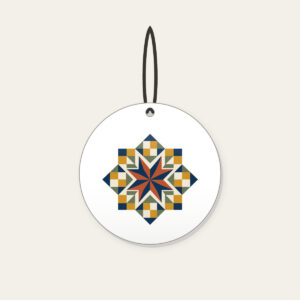 Star Medallion Patchwork Ceramic Ornament in white: An eight-point star medallion in navy, cream and rust with mustard and sage patchwork squares.
