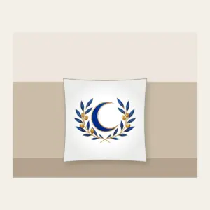 Crescent Moon and Olive Sprigs Pillow in white: A centered crescent moon is flanked by olive sprigs in cobalt and gold line art on white.