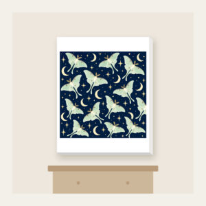 Luna Moths and Crescent Moons on Navy Canvas Print in white: Pale luna moths and crescent moons glow on deep navy among tiny star dots.