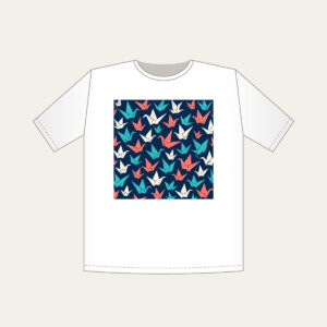 Origami Cranes on Navy T-Shirt in white: Folded paper cranes in coral, teal and cream scatter across a navy ground.
