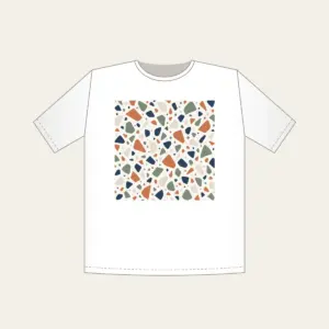 Chip Terrazzo in Terracotta and Navy T-Shirt in white: An all-over terrazzo of chips in terracotta, sage, navy and cream on a warm white field.