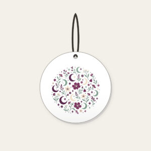 Crescent Moons and Wildflowers in Plum Ceramic Ornament in white: Crescent moons, wildflowers and tiny stars repeat in plum, mint and cream.
