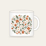 Garden Terrazzo of Leaves and Blossoms Mug in white: An all-over terrazzo of leaves, pebbles and blossoms in terracotta, sage and cream.