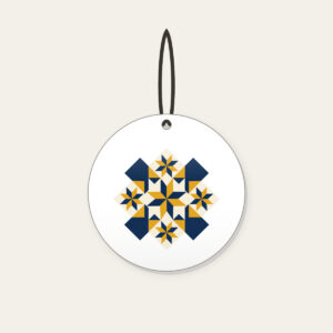 Mustard and Navy Patchwork of Stars Ceramic Ornament in white: A patchwork of stars and diamonds in navy, mustard and cream.
