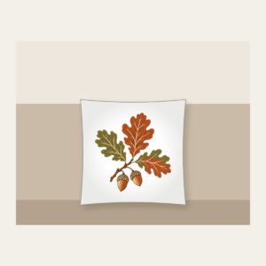 Oak Branch with Acorns Pillow in white: An oak branch with three leaves and two acorns in rust, olive and cream.