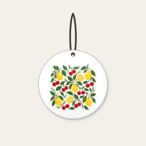 Cherry and Lemon Orchard Pattern Ceramic Ornament in white: Cherries, lemons and leaves in red, yellow and green scattered across a cream field.