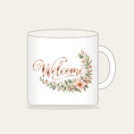 Rose Gold Welcome Wildflower Garland Mug in white: The word “Welcome” in rose gold mirror lettering, with a blush and sage wildflower garland curling into one corner.