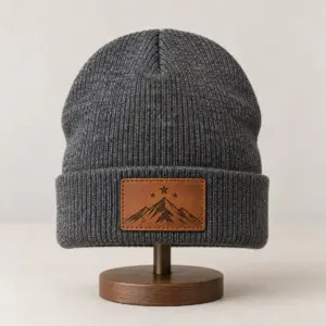Charcoal Starry Peak Engraved Leather Patch Beanie with engraved-look artwork on a rectangular leather patch of a mountain peak and three stars, Rec_RDBrown style patch, Dark Heather Grey beanie