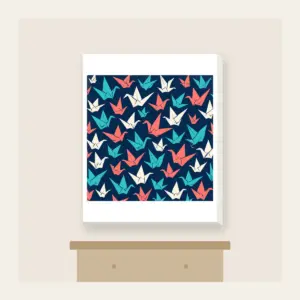 Origami Cranes on Navy Canvas Print in white: Folded paper cranes in coral, teal and cream scatter across a navy ground.