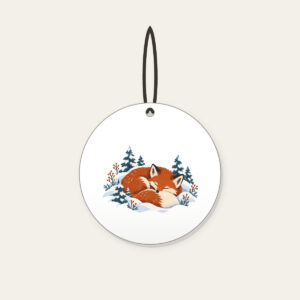 Sleeping Fox Among Snowy Pines Ceramic Ornament in white: A fox curled asleep in a snowbank with tiny pines, in rust, cream and slate blue.