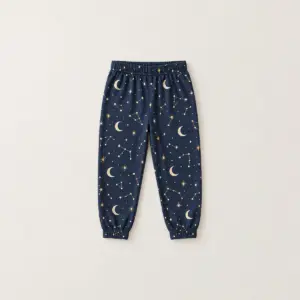 Bedtime Constellation Kids Pajama Pants with small constellations and crescent moons in cream and gold on navy