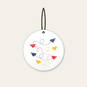 Paper Planes and Dotted Flight Paths Ceramic Ornament in white: Paper planes trace dotted flight paths across cream in navy, red and yellow.