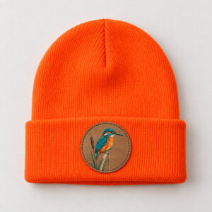 Kingfisher Patch Beanie with a small kingfisher on a reed printed on the patch in teal and orange
