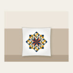 Star Medallion Patchwork Pillow in white: An eight-point star medallion in navy, cream and rust with mustard and sage patchwork squares.