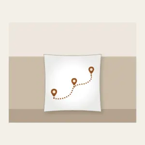 Dotted Route Linking Map Pins Pillow in white: A dotted route line connects small map pins in cream on warm brown.