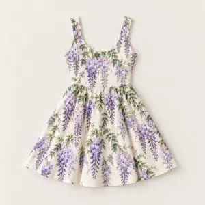 Wisteria Bloom Sleeveless Dress with hanging wisteria clusters in lilac and violet with green leaves on a cream base