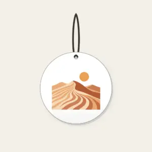 Dune Ripples with a Small Sun Ceramic Ornament in white: Sand dune ripples in warm tan, terracotta and cream under a small sun.