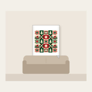 Cabin, Tree and Star Patchwork Fleece Blanket in white: Patchwork squares hold simple cabin, tree and star motifs in red, cream and green.