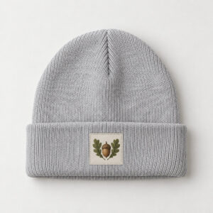 Tiny Acorn Patch Cuffed Beanie with a small patch with an acorn and two oak leaves in brown and moss green