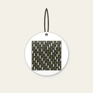Staggered Olive Dashes on Charcoal Ceramic Ornament in white: Short olive and cream dashes in a staggered rhythm on charcoal.