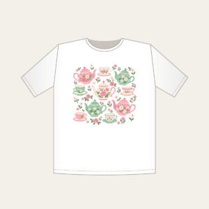 Teapots and Tiny Flowers T-Shirt in white: Cheerful teapots and little flowers in pink and mint scatter across a cream ground.