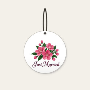 Cherry Blossoms and Just Married Wording Ceramic Ornament in white: A cluster of cherry blossoms in deep rose pink and dark green, with the words “Just Married” in dark plum below.