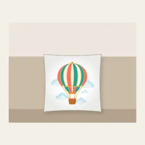 Striped Hot Air Balloon Pillow in white: A hot air balloon with coral, teal and gold stripes drifts above small clouds, a tiny basket below.