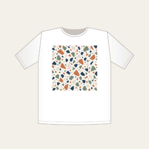 Chip Terrazzo in Terracotta and Navy T-Shirt in white: An all-over terrazzo of chips in terracotta, sage, navy and cream on a warm white field.