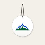 Cobalt Zigzag Mountain Peaks Ceramic Ornament in white: Zigzag mountain peaks in cobalt and white over a deep green base.