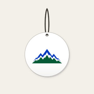 Cobalt Zigzag Mountain Peaks Ceramic Ornament in white: Zigzag mountain peaks in cobalt and white over a deep green base.
