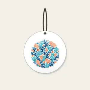 Branching Coral and Tiny Fish on Deep Blue Ceramic Ornament in white: Branching coral and small fish in teal and orange swim across a deep blue background.